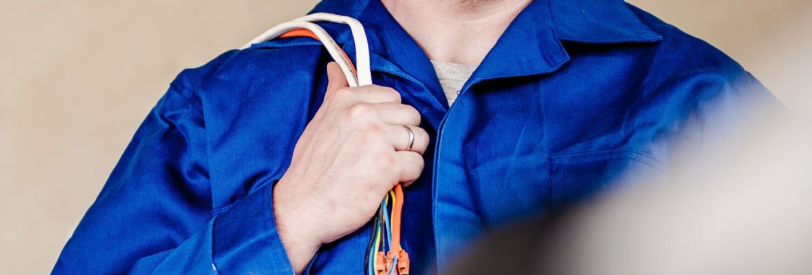 Electrician with Cables over Shoulder